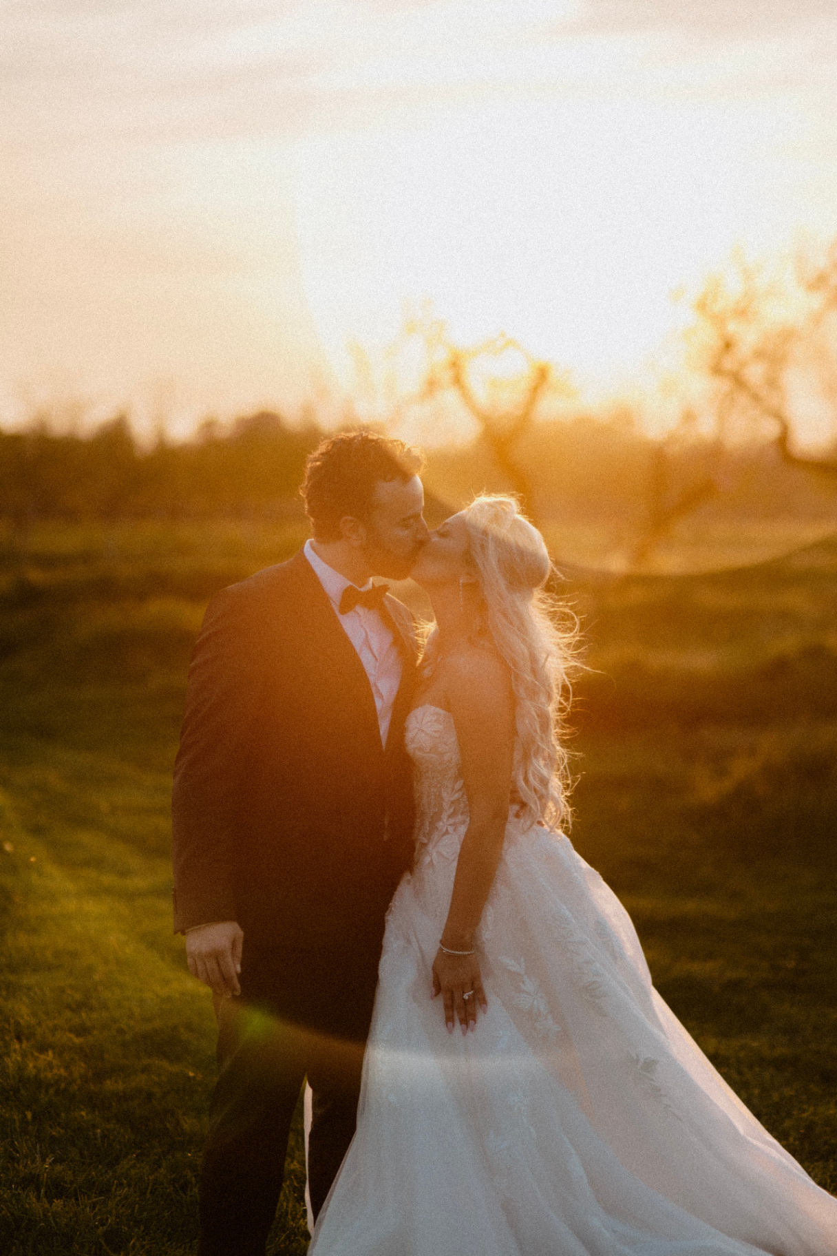 Couple kissing in sunset light